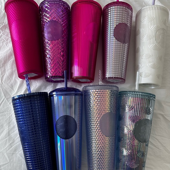 Starbucks cups, all nine of them